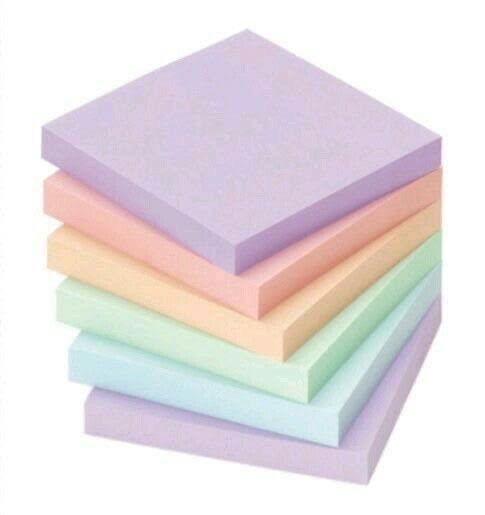 Stack of square pastel sticky-note pads